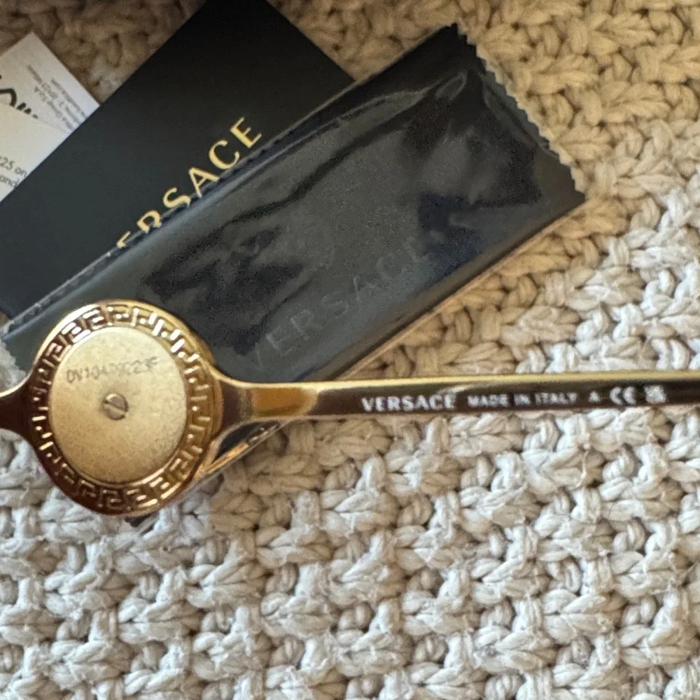 Versace Gold Metal Frame Sunglasses with Brown Lenses